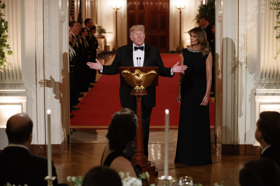 President Donald Trump, with first lady Melania Trump, speaks at the Governors' Ball, Sunday, Feb. 9, 2020, in the East Room of the White House in Washington. (AP Photo/Jacquelyn Martin)