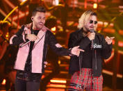 FILE - In this Oct. 25, 2018, file photo, Prince Royce, left, and Maluma perform "El Clavo" at the Latin American Music Awards at the Dolby Theatre in Los Angeles. Royce says he’s looking forward to headlining the 2019 Major League Soccer All-Star Concert because he loves singing live. He also looks to gain some new fans. (Photo by Chris Pizzello/Invision/AP, File)