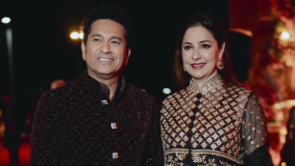 Former India cricket star Sachin Tendulkar with his wife Anjali. - Reliance group/AP