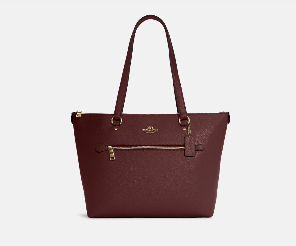 Coach Outlet Gallery Tote in black cherry (Photo via Coach Outlet)