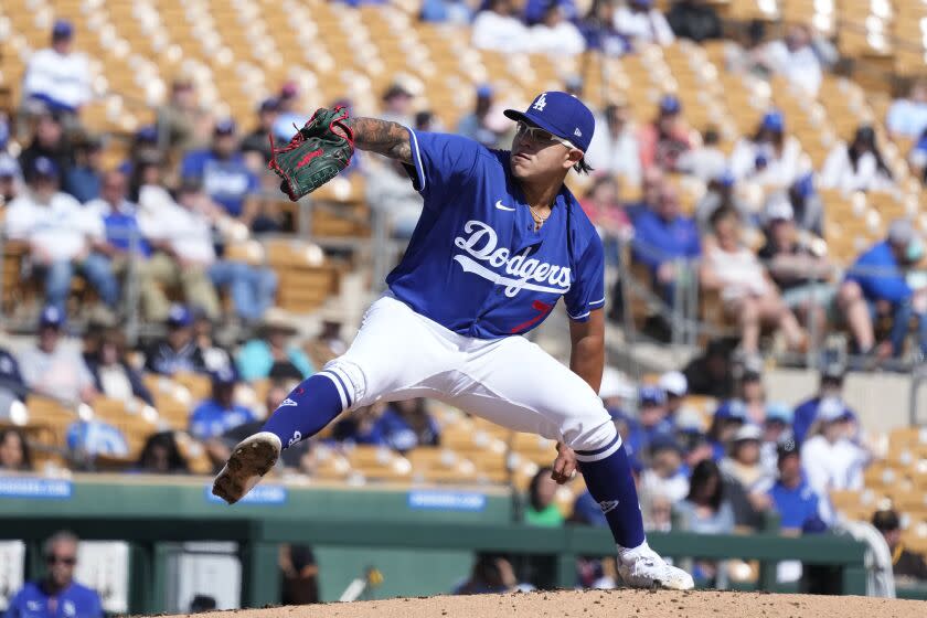 Los Angeles Dodgers starting pitcher Julio Urias throws a pitch against the Cincinnati Reds.