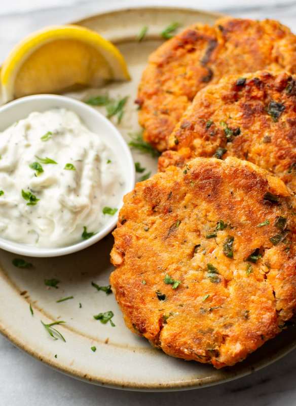 <p>Salt and Lavender</p><p>This salmon patties recipe is an inexpensive pantry meal that's ready in just 30 minutes! They're ultra crispy on the outside, flaky and moist inside and supremely flavorful with fresh herbs.</p><p><strong>Get the recipe: <a href="https://www.saltandlavender.com/salmon-patties/" rel="nofollow noopener" target="_blank" data-ylk="slk:Salmon Patties;elm:context_link;itc:0;sec:content-canvas" class="link ">Salmon Patties</a></strong></p>