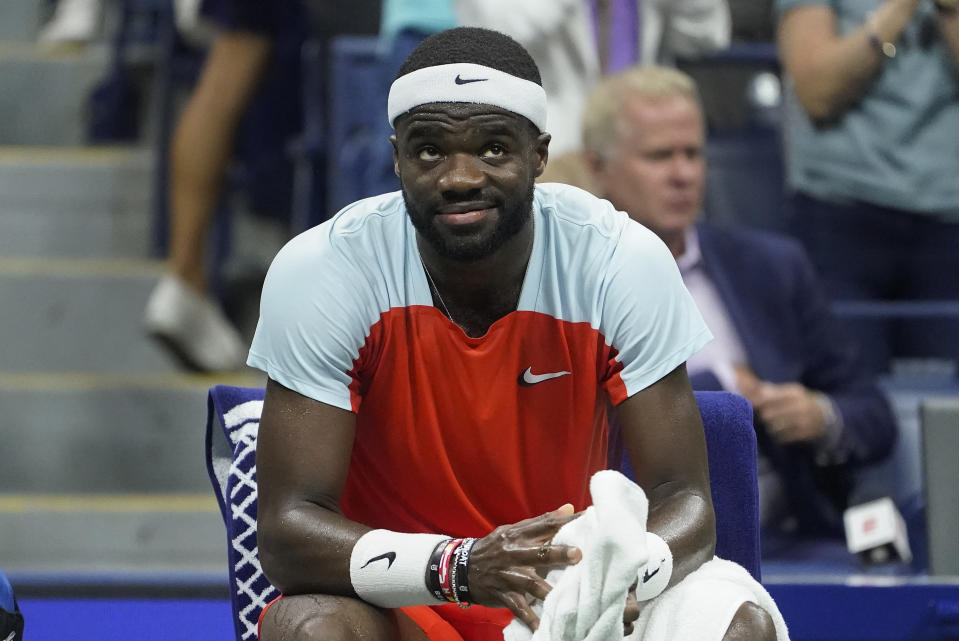 Frances Tiafoe, of the United States, takes a break between sets against Carlos Alcaraz, of Spain, during the semifinals of the U.S. Open tennis championships, Friday, Sept. 9, 2022, in New York. (AP Photo/John Minchillo)