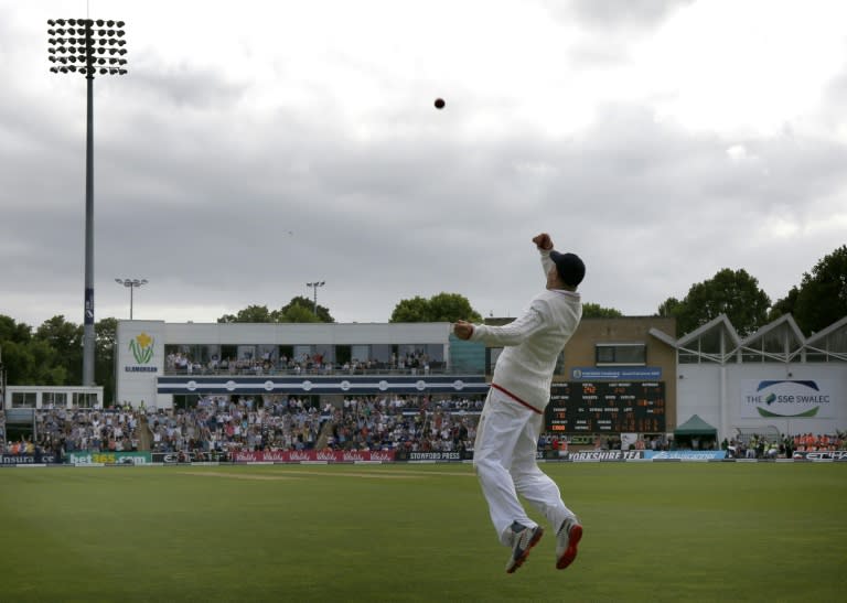 England's Joe Root celebrates catching Australia's Josh Hazlewood to win the first test for England on the fourth day of the opening Ashes Test match in Cardiff, south Wales, on July 11, 2015