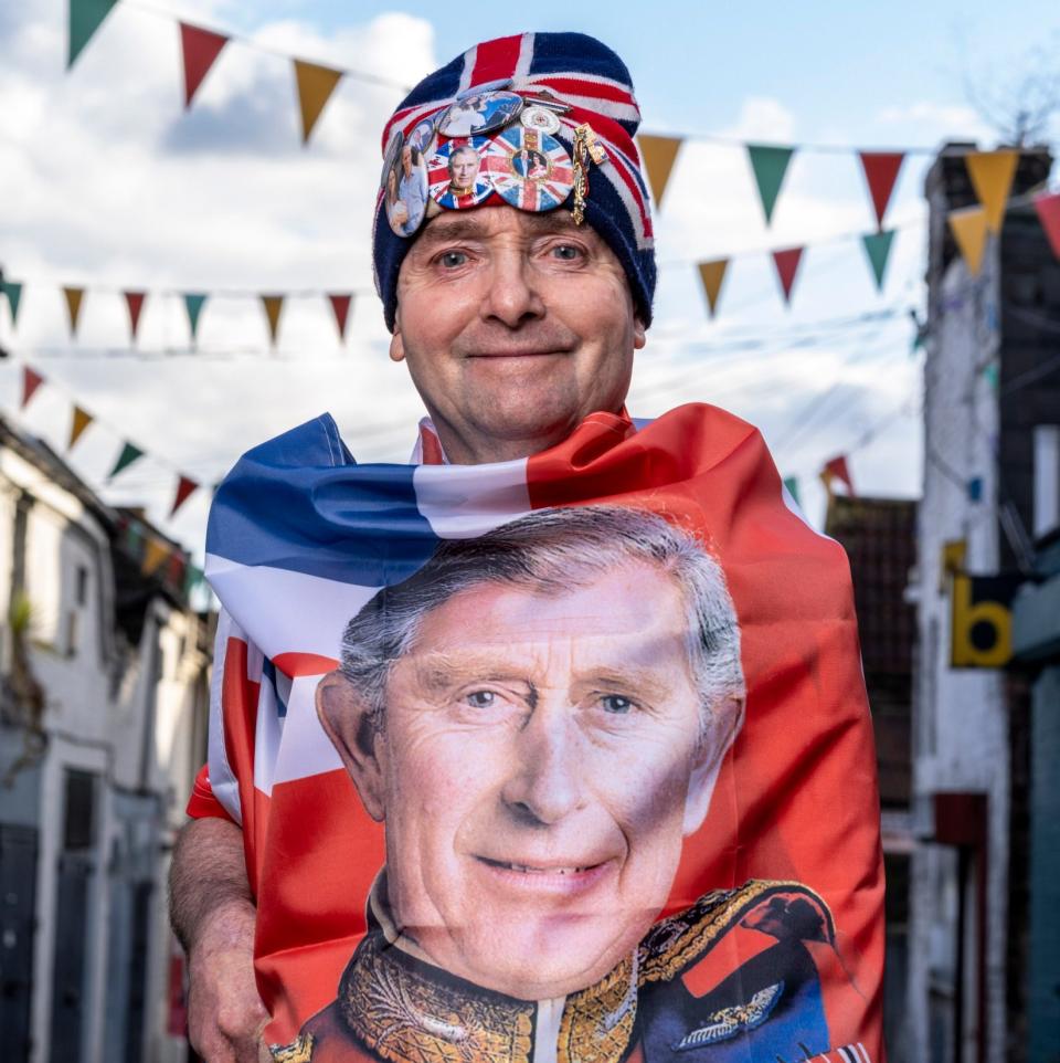 John Loughrey wrapped in King Charles flag - Andrew Crowley