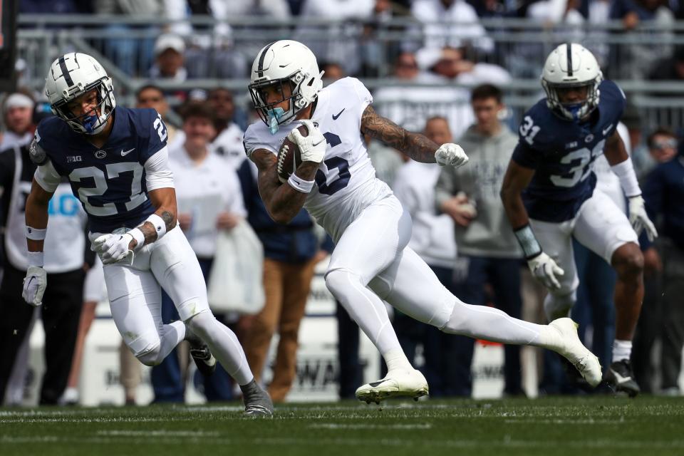 Apr 13, 2024; University Park, PA, USA; Penn State Nittany Lions wide receiver Tre Wallace (6) runs with the ball during the second quarter of the Blue White spring game at Beaver Stadium. Mandatory Credit: Matthew O'Haren-USA TODAY Sports