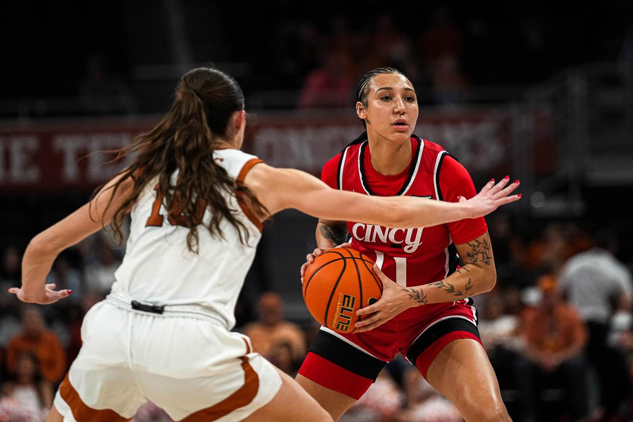 Cincinnati guard Ta'Ziah Jenks (11) is guarded by Texas Longhorns guard Shay Holle (10) during the women’s basketball game at the Moody Center on Saturday, Jan. 27, 2024 in Austin.