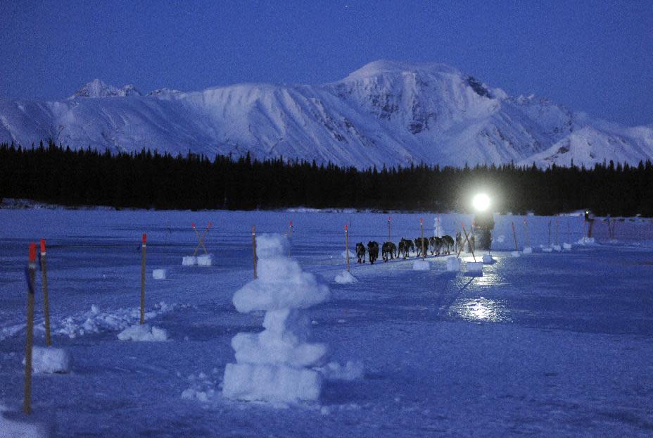 John Baker comes into the Finger Lake checkpoint during the 2014 Iditarod Trail Sled Dog Race on Monday, March 3, 2014, near Wasilla, Alaska. (AP Photo/The Anchorage Daily News, Bob Hallinen)