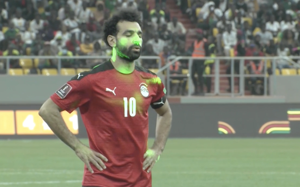 Mo Salah and Egypt will miss the World Cup after being faced with laser pointers all game against Senegal. (Screenshot: ESPN+)