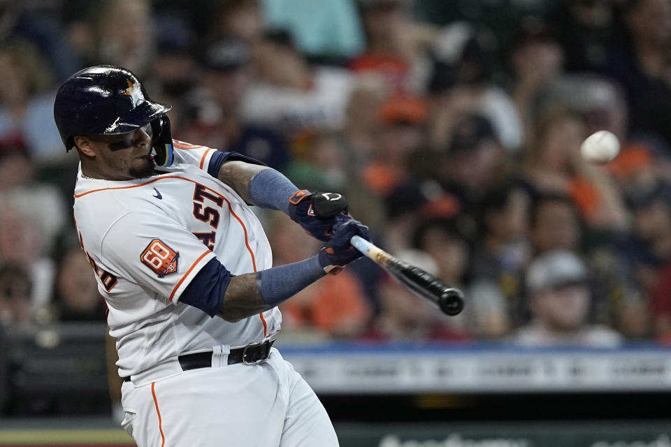 Houston Astros' Martin Maldonado hits a home run against the Los Angeles Angels during the second inning of a baseball game Saturday, July 2, 2022, in Houston. (AP Photo/David J. Phillip)