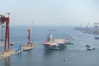 China's first domestically built aircraft carrier is seen during its launching ceremony in Dalian, Liaoning province, China. REUTERS/Stringer