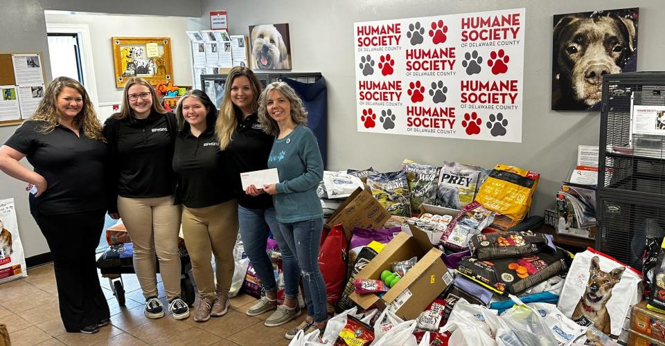 Petland store leaders donate food and more to Delaware Co. Humane Society. Pictured (l-r) Cara Slone, Petland Charities, Emily Geiger (Grove City), Paige Edwards (East Broad St.), Jenna Wester (Lewis Center) and Heather Hoover (Humane Society of Delaware Co.
