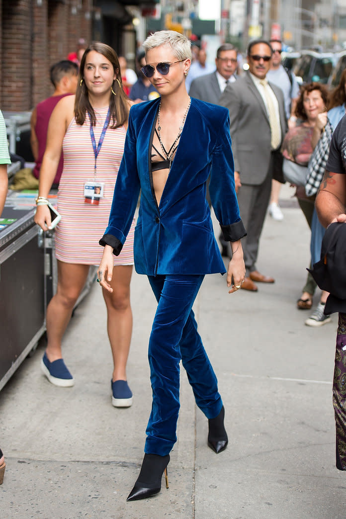 Cara Delevingne defied the summery N.Y.C. temperatures in a velvet suit.