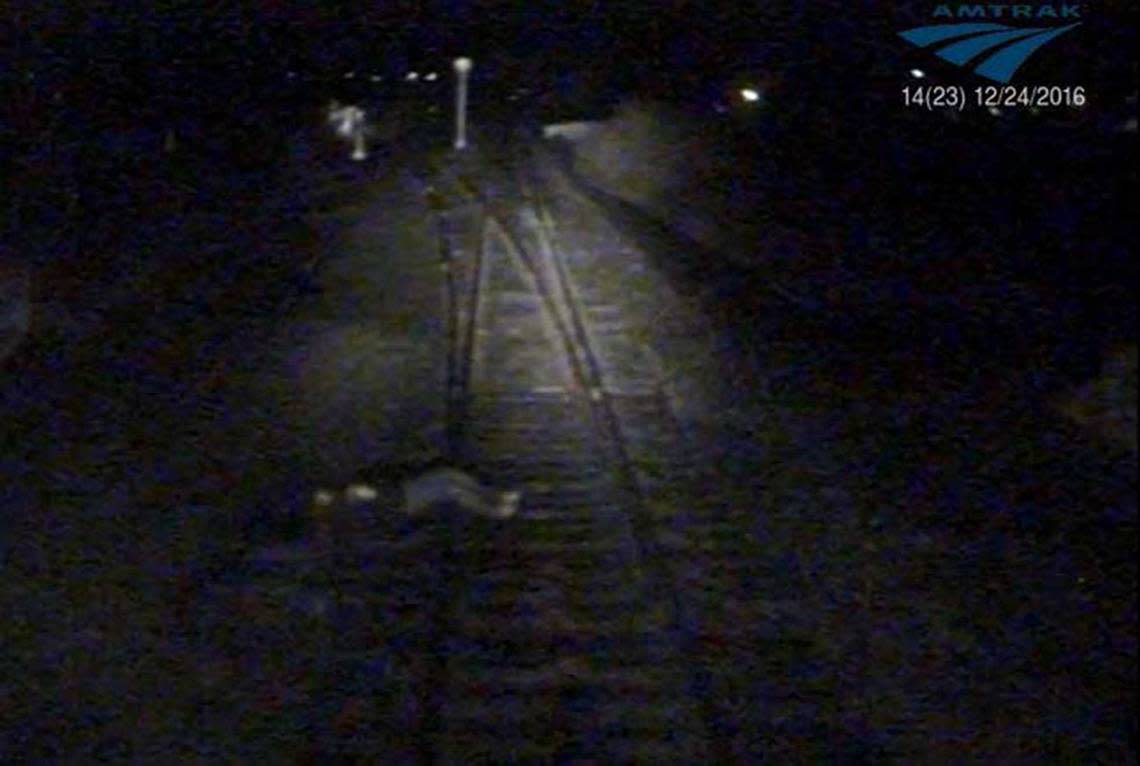 In an image captured by an Amtrak train’s video camera, Joe Nevis is seen lying on the railroad tracks seconds before his legs were severed by the locomotive in Marysville, Calif. on Dec. 24, 2016. Nevis is suing Amtrak and others in federal for the incident, which confined him to a wheelchair.