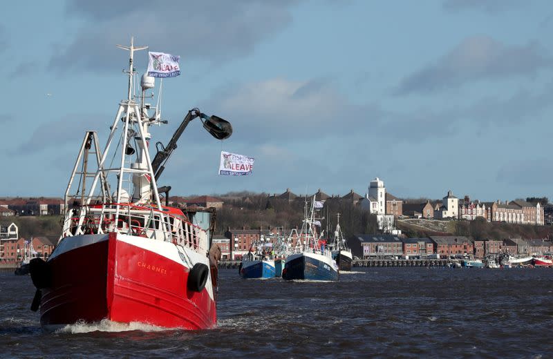 FILE PHOTO: Fishing boats take part in a Brexit flotilla, organised by Fishing For Leave, in Newcastle upon Tyne