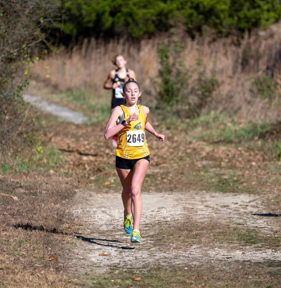 Indian River’s Brynn Crandell takes first as she runs in the DIAA 2022 Cross Country Girl’s Division II Championship at Killens Pond State Park in Felton, Del.