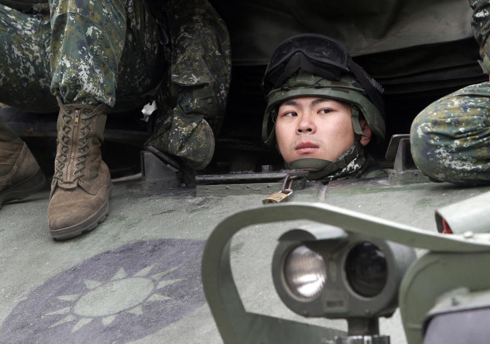 A Taiwanese soldier watches from an M60A3 Patton tank during a military exercises in Taichung, central Taiwan, Thursday, Jan. 17, 2019. Taiwan’s military has conducted a live-fire drill on Thursday to show its determination to defend itself from Chinese threats. (AP Photo/Chiang Ying-ying)