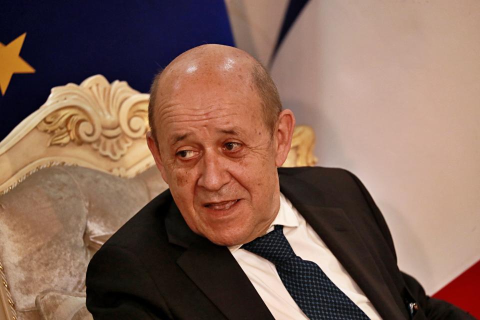 French Foreign Minister Jean-Yves Le Drian, meets with his meet his Iraqi counterpart Fouad Hussein in Baghdad, Iraq, Thursday, July 16, 2020. (AP Photo/Hadi Mizban)