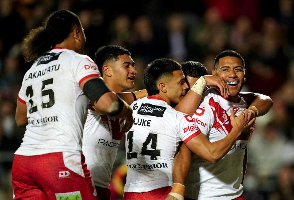 Tongas Moeaki Fotuaika (pictured) celebrates with his teammates at the Rugby League World Cup.