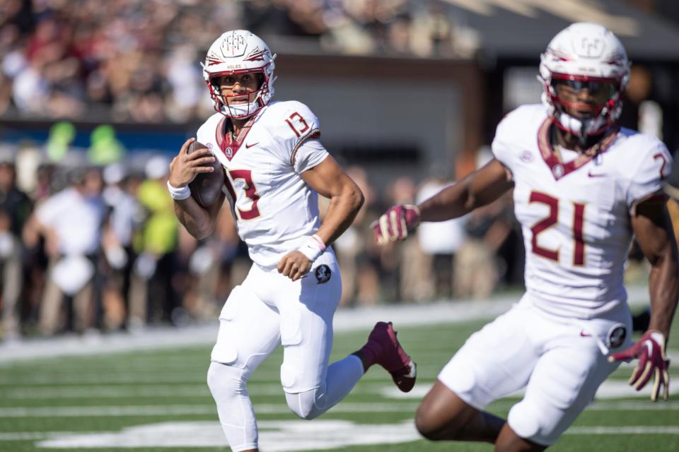 October 28, 2023: Florida State Seminoles quarterback Jordan Travis (13) scrambles for a touchdown during the NCAA football game between the Florida State Seminoles and the Wake Forest Demon Deacons at Allegacy Federal Credit Union Stadium in Winston-Salem, NC. Jonathan Huff/CSM (Credit Image: © Jonathan Huff/Cal Sport Media) (Cal Sport Media via AP Images)