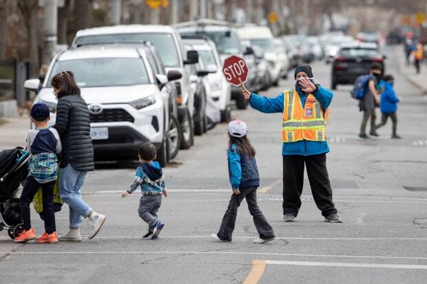 Children In Toronto head home after their last day of school on Apr. 6, 2021, when Toronto Public Health ordered all public schools to close amidst a surge of COVID-19 cases.