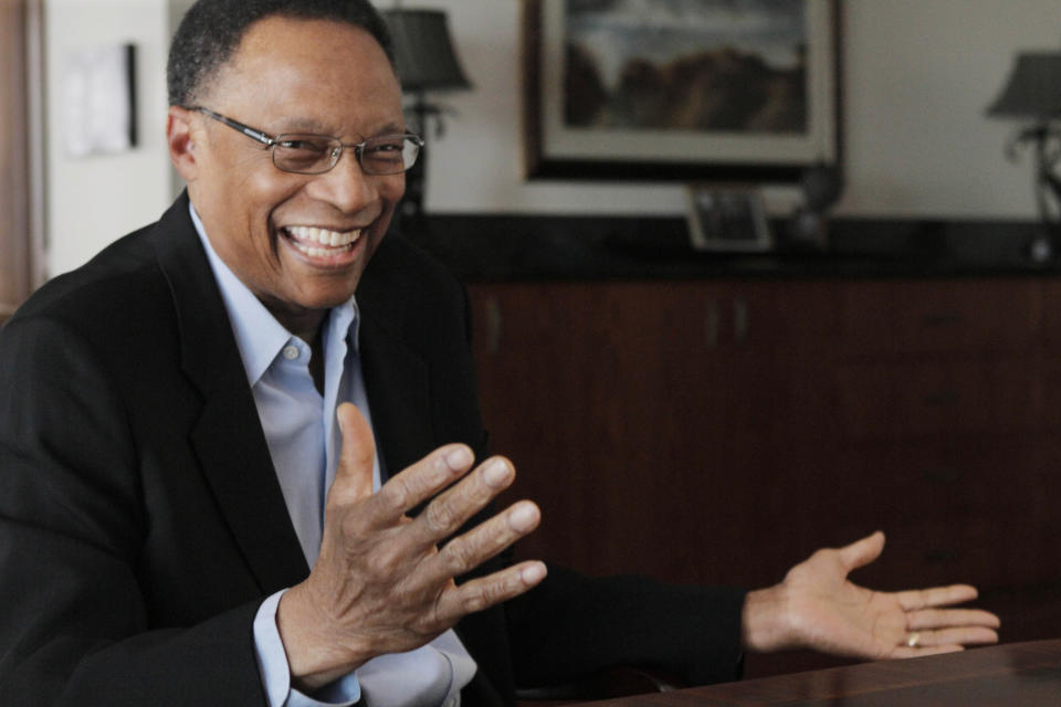 FILE - Jazz pianist and composer Ramsey Lewis describes his composing methods during an interview at his home in Chicago, April 5, 2011. Renowned jazz pianist Lewis, whose music entertained fans over a more than 60-year career that began with the Ramsey Lewis Trio and made him one of the country’s most successful jazz musicians, died Monday, Sept. 12, 2022. He was 87. (AP Photo/M. Spencer Green, File)