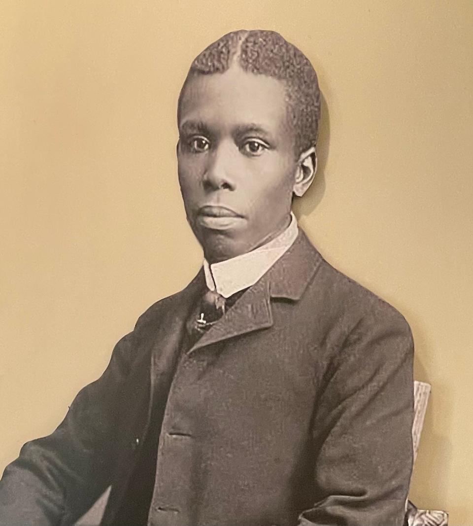 A cutout figure at the Dunbar House visitors center depicts Paul Laurence Dunbar.