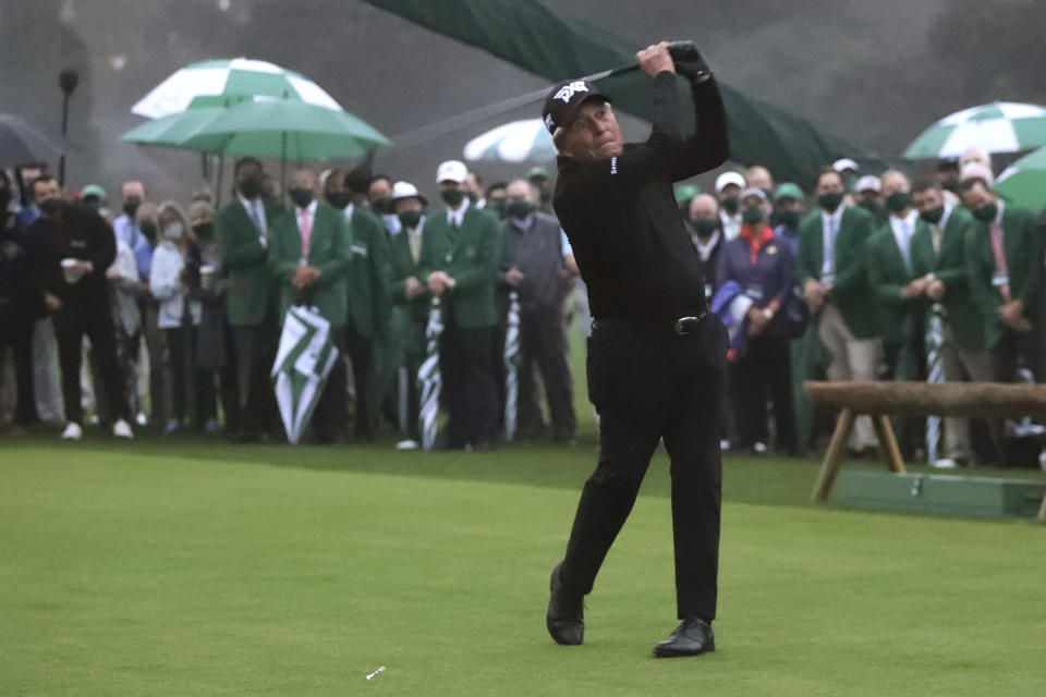 Honorary starter Gary Players hits on the first tee to start the first round of the Masters golf tournament Thursday, Nov. 12, 2020, in Augusta, Ga. (Curtis Compton/Atlanta Journal-Constitution via AP)