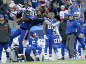 <p>New England Patriots tight end Rob Gronkowski, left, makes a catch as Buffalo Bills cornerback Tre’Davious White (27) defends during the second half of an NFL football game, Sunday, Dec. 3, 2017, in Orchard Park, N.Y. Bills head coach Sean McDermott, right, looks on during the play. (AP Photo/Adrian Kraus) </p>