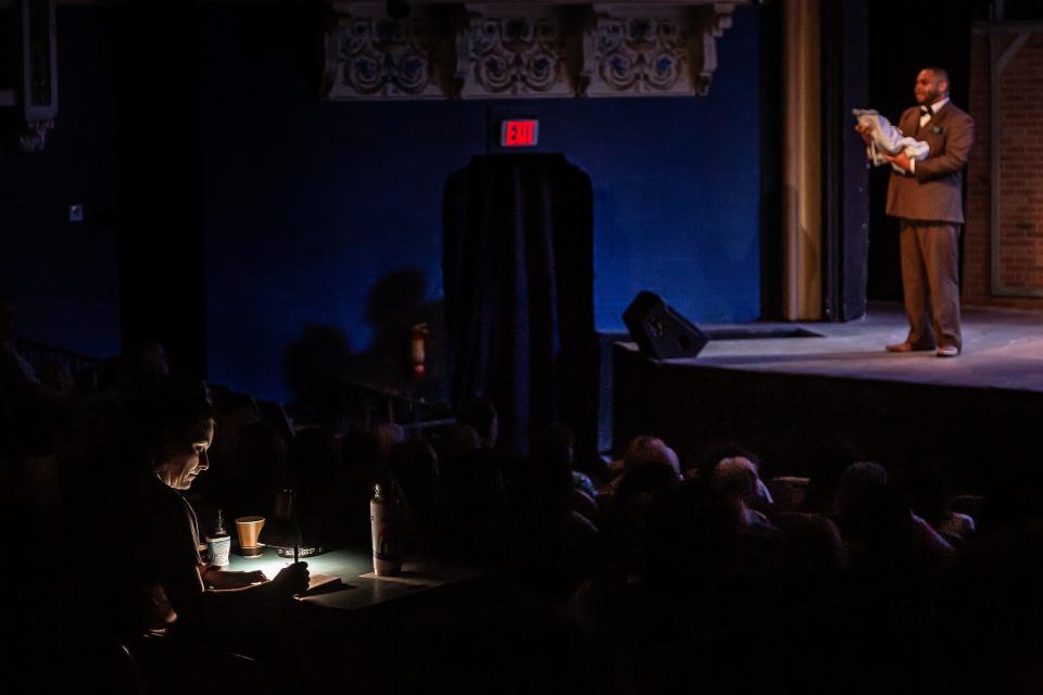 Director Sabrina Lynn Gore, left, makes notes during the final dress rehearsal.