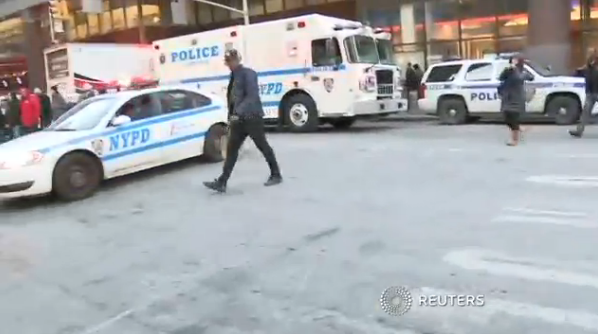 <em>NYPD patrol cars rush to the scene in downtown New York. (Reuters)</em>