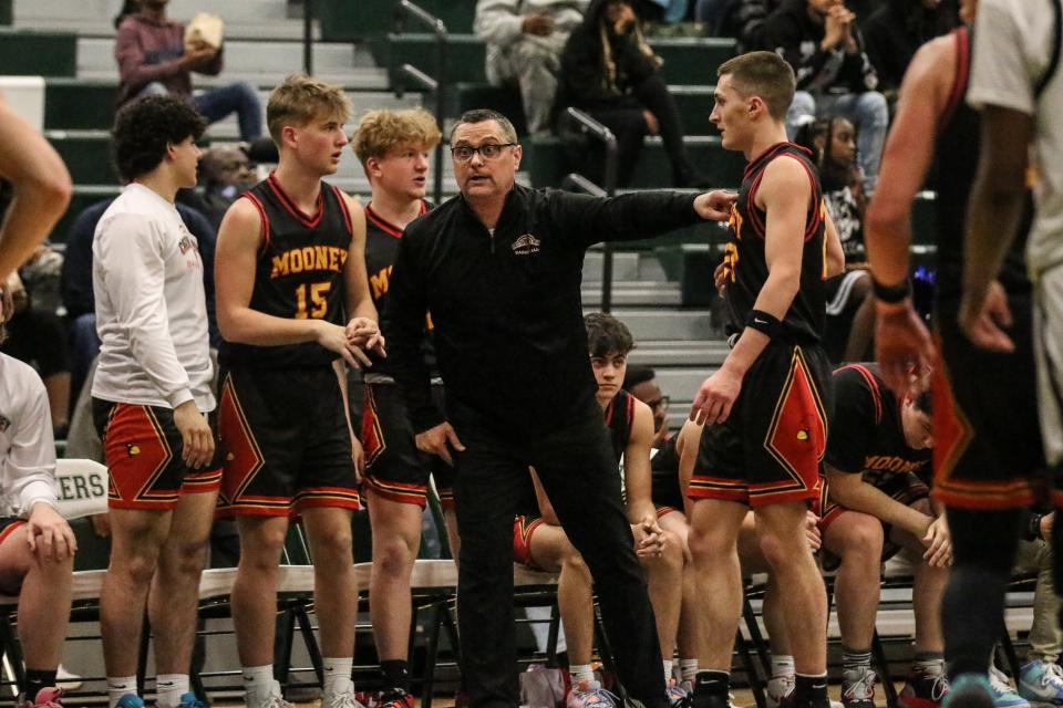 Cardinal Mooney coach Mike McAndrews is seen during the Cardinals' 59-56 win over Taylor Trillium Academy in a Division 4 state quarterfinal at West Bloomfield High School on Tuesday, March 21, 2023.