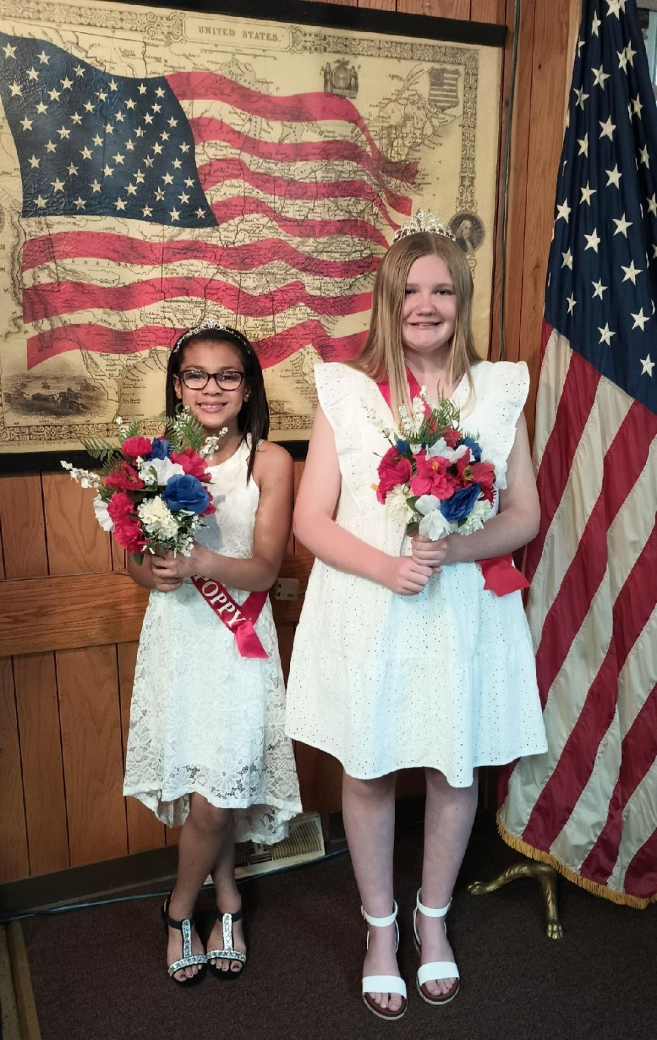 Ava Lorentz (left) and Adrianna Reed-Banks will be flower representatives for VFW Post 106 for Memorial Day.