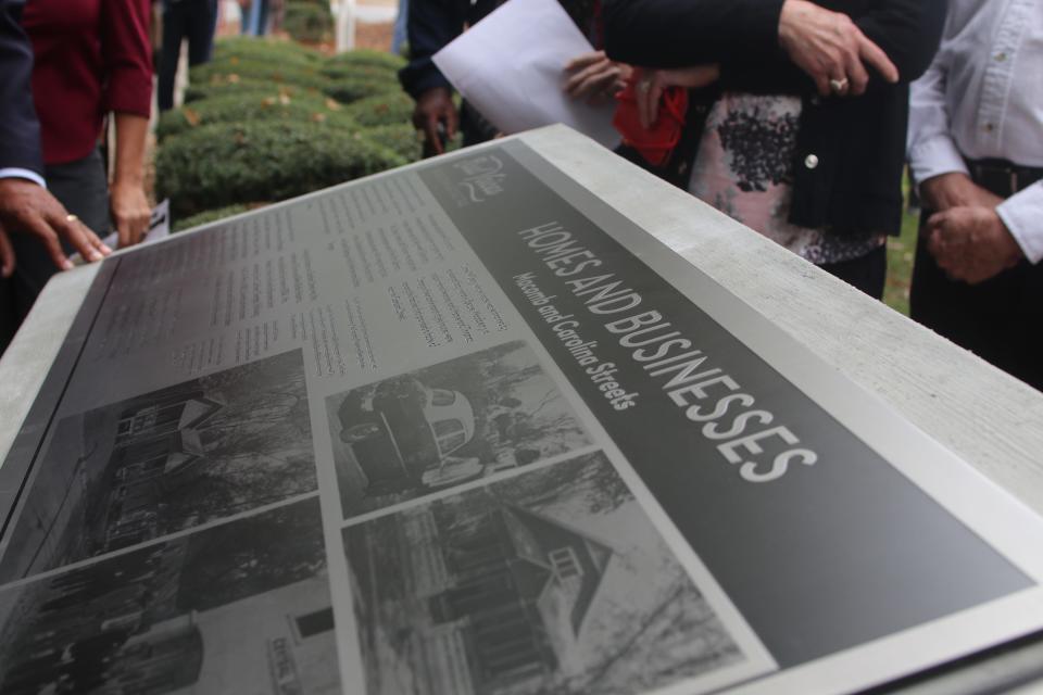 One of several historical markers in Frenchtown accompanied by oral history audio, photographed at the unveiling Friday, Nov. 8, 2019.