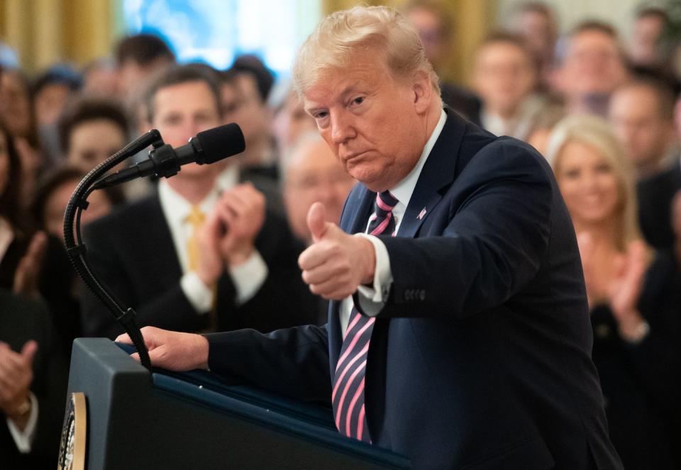 Photos of Trump's Bonkers Post-Impeachment Presser Show His Most Unhinged Speech to Date