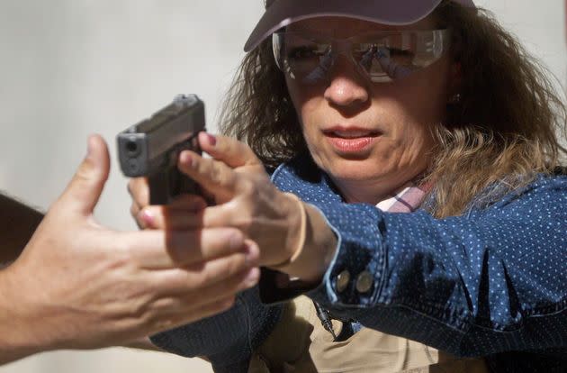 Cindy Bullock, Timpanogos Academy secretary, participates in shooting drills at the Utah County Sheriff's Office shooting range during the teacher's academy training, June 29, 2019.