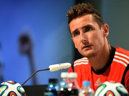 Miroslav Klose answers questions during a press conference on Thursday. (AFP)