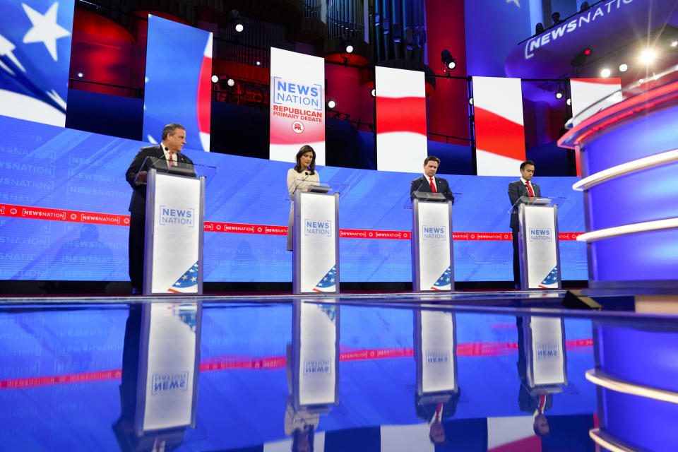 Republican presidential candidates from left, former New Jersey Gov. Chris Christie, former U.N. Ambassador Nikki Haley, Florida Gov. Ron DeSantis, and businessman Vivek Ramaswamy during a Republican presidential primary debate hosted by NewsNation on Wednesday, Dec. 6, 2023, at the Moody Music Hall at the University of Alabama in Tuscaloosa, Ala. (AP Photo/Gerald Herbert)