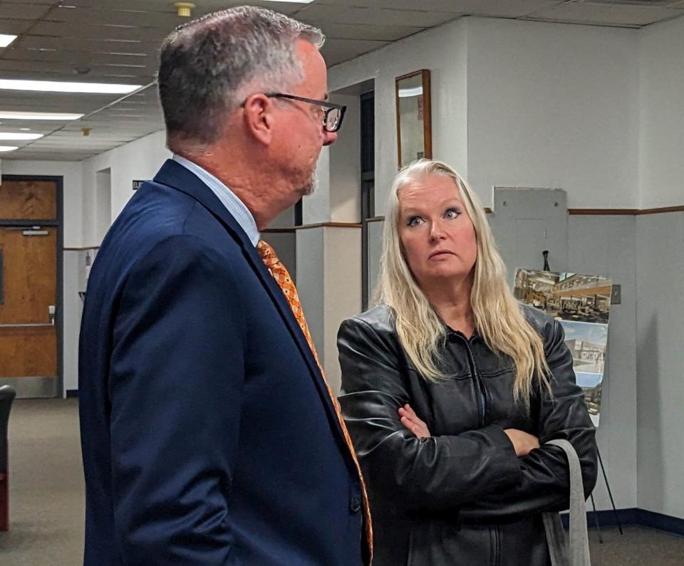 During a break in the Monday, March 20, 2023, meeting, Wichita Falls ISD Place 5 Trustee Jim Johnson talks with Jeanette Perry, a proponent of keeping the Legacy Leopards and Memorial Mavericks as mascots for the new high schools.