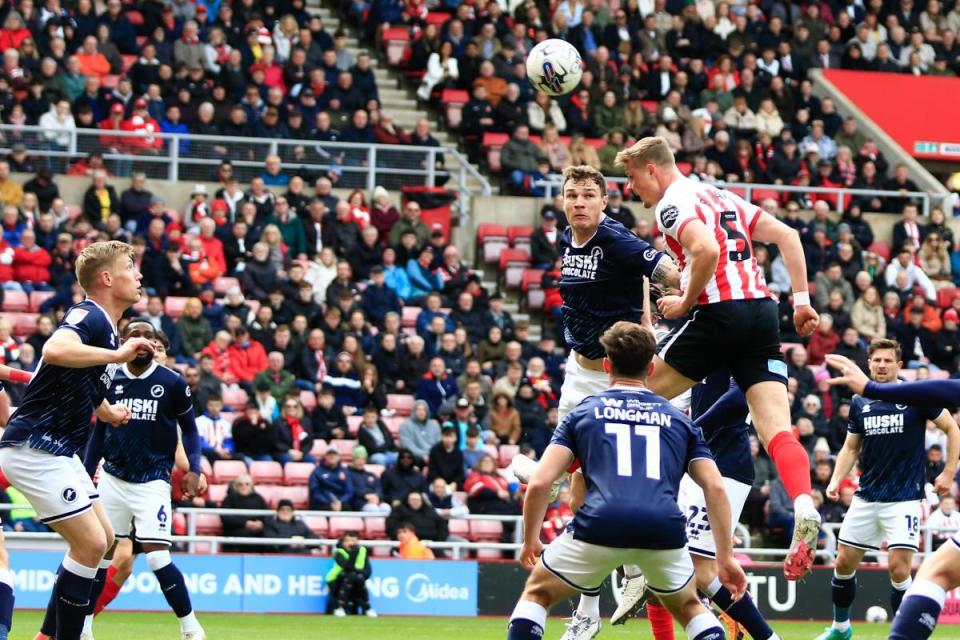 Dan Ballard wins a header in Sunderland's defeat to Millwall <i>(Image: Ian Horrocks)</i>