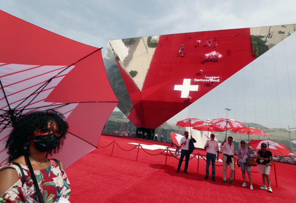 People visit the Switzerland Pavilion at the Dubai Expo 2020, in Dubai, United Arab Emirates, Sunday, Oct, 3, 2021. (AP Photo/Kamran Jebreili)