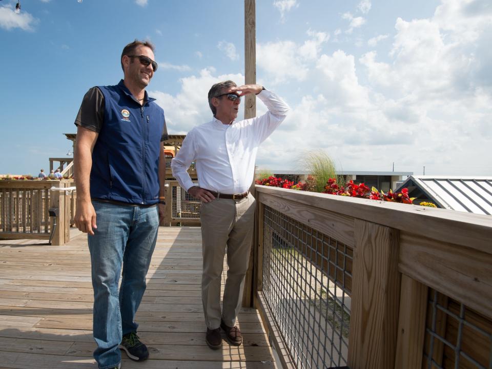 Josh Grapski walked with Gov. John Carney at Big Chill Beach Club to talk about the importance of the tourism economy in this file photo.