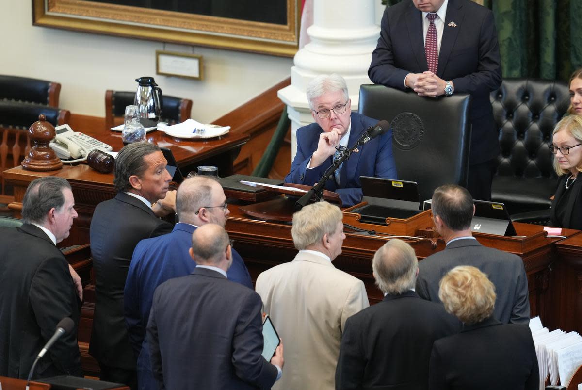 Texas Lt. Governor Dan Patrick calls the attorneys and staffs to the dais during the afternoon session of Day 1 of the Ken Paxton impeachment trial in the Texas Senate.