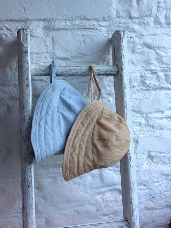 Get it on <a href="https://www.etsy.com/listing/616782027/linen-brimmed-sun-hat-linen-sun-bonnet?ga_order=most_relevant&amp;ga_search_type=all&amp;ga_view_type=gallery&amp;ga_search_query=sun%20hats%20for%20babies&amp;ref=sc_gallery-1-3&amp;plkey=2019bc3b196dabb1254f3ac48ffa8f68476f54ef:616782027" target="_blank">Etsy</a>, $39.