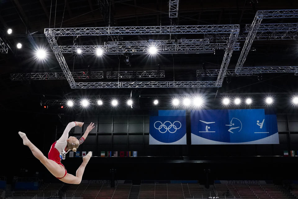 Angelina Melnikova, of Russian Olympic Committee, competes on floor exercise during the women's artistic gymnastic qualifications at the 2020 Summer Olympics, Sunday, July 25, 2021, in Tokyo, Japan. (AP Photo/Ashley Landis)