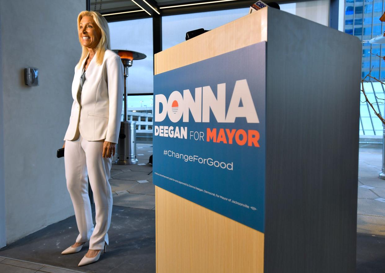 Democratic Jacksonville mayoral candidate Donna Deegan stands beside her podium after she addressed the audience as election results showed her with a significant lead over Republican Daniel Davis during Deegan's election night party on March 21.