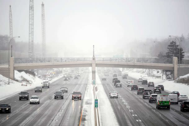 PHOTO: Traffic is moving on interstate 35W during a snowstorm in Minneapolis, Feb. 22, 2023. (Craig Lassig/AFP via Getty Images)