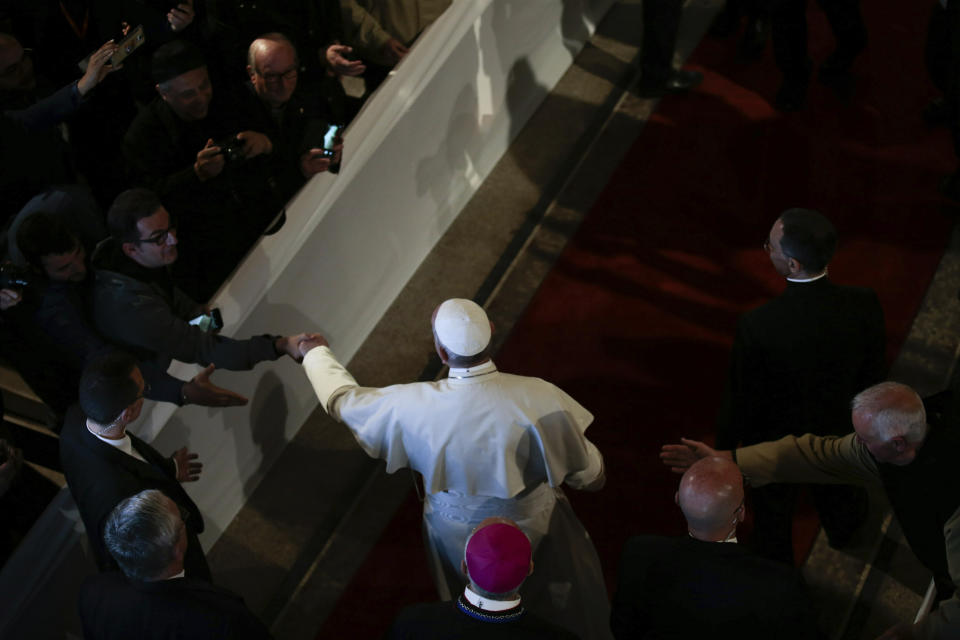 Pope Francis arrives for a meeting with Catholic priests and other Christian representatives in the cathedral of the capital, Rabat, Morocco, Sunday, March 31, 2019. Pope Francis is in Morocco for a two-day trip aimed at highlighting the North African nation's Christian-Muslim ties, while also showing solidarity with migrants at Europe's door and tending to a tiny Catholic flock. (AP Photo/Mosa'ab Elshamy)