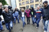 Relatives of Lebanese soldiers and policemen freed by jihadist groups after being held for over a year celebrate in Beirut on December 1, 2015