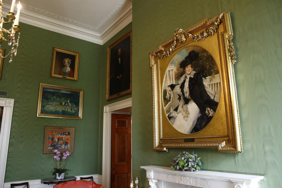 This Sept. 17, 2019, photo shows a portrait of former first lady Edith Roosevelt, right, wife of President Theodore Roosevelt, in the Green Room of the White House in Washington. The portrait was placed in the Green Room as part of the improvement projects first lady Melania Trump has overseen to keep the well-trod public rooms at 1600 Pennsylvania Avenue looking their museum-quality best. (AP Photo/Patrick Semansky)